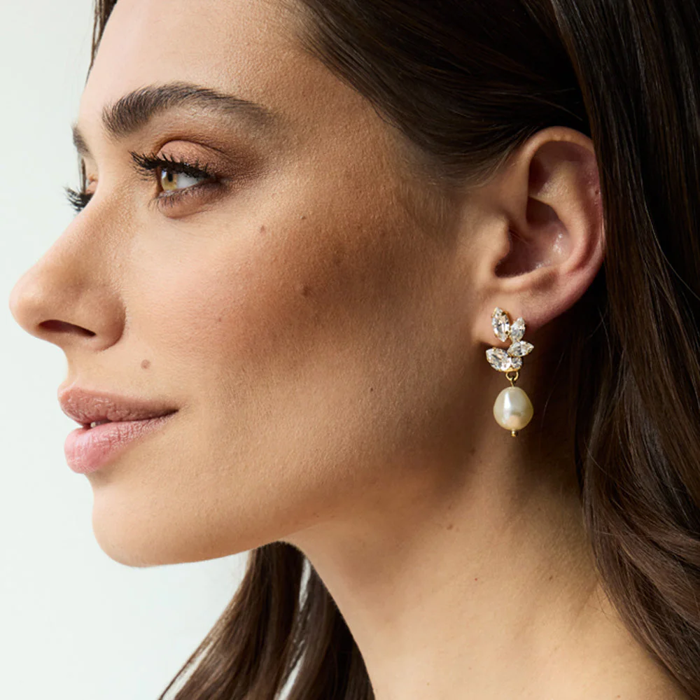 Caroline Svedbom pearls of promise earrings gold on ear
