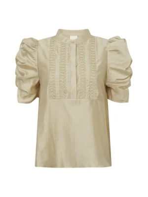 The AnnsofiGO Lull Blouse is a silk-soft elegant women’s blouse with a lightweight feel and flattering drape. Pair with tailored trousers for a polished, sophisticated look suitable for occasions or everyday wear.
