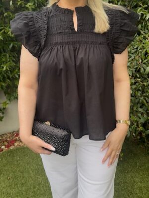 Black ruffle detail summer top with cap sleeves and relaxed fit Model front