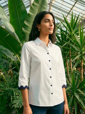 Stylish White shirt with navy trim and floral buttons front view