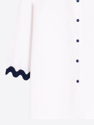 Vilagallo Close Up of White cotton shirt with navy floral buttons and contrast sleeve detail