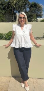 GOSSIA AnnGO pleated ruffle top with feminine A-line silhouette - off white
