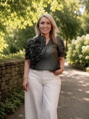 dusty green GOSSIA AnnsofiGO blouse with oversized floral appliqué detail and puff sleeves