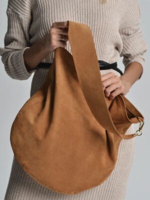 Ana Suede Bag in caramel. Close up shot.