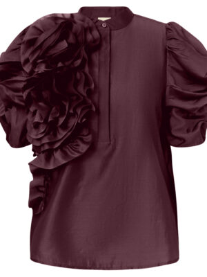 Product image of the AnnsofiGo Blouse in burgundy featuring features dramatic puff sleeves, oversized floral appliqué detailing