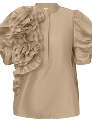 Product image AnnsofiGo Blouse in Dusty Champagne. Featuring features dramatic puff sleeves, oversized floral appliqué detailing.